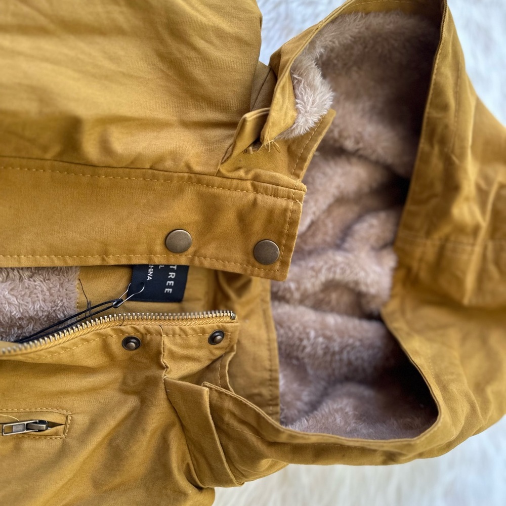 Ladies size small military safari vest with hoodie.